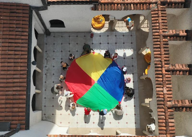 Romanian school kids tarp outside - stories_video-player-image-1200x860