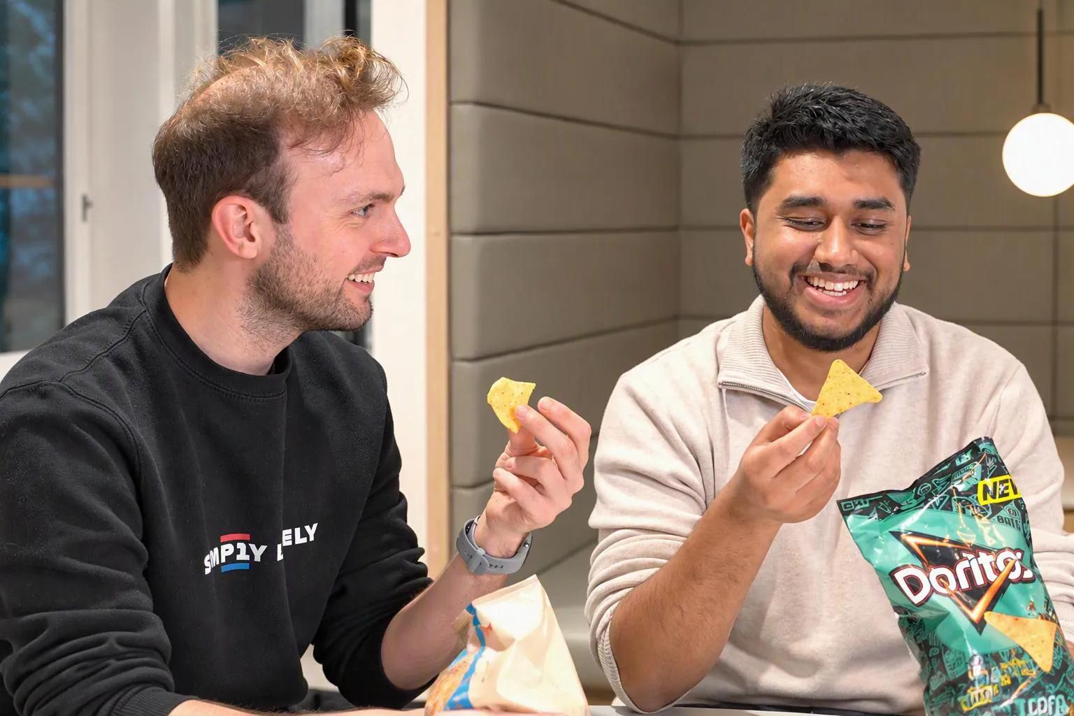 two-individuals-holding-doritos.jpg