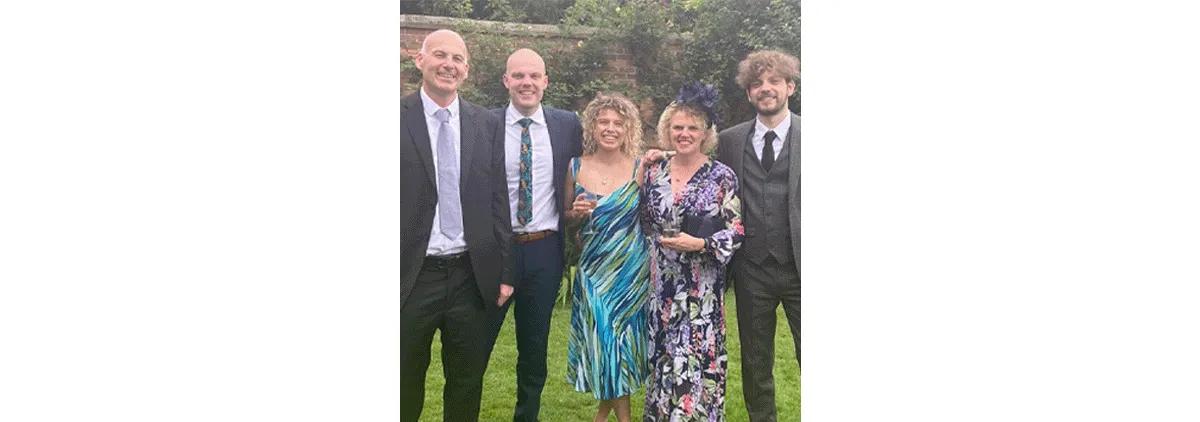 Graham Rhodes (left) with son James, daughter Phoebe, wife Emma and son Charlie (from left to right).