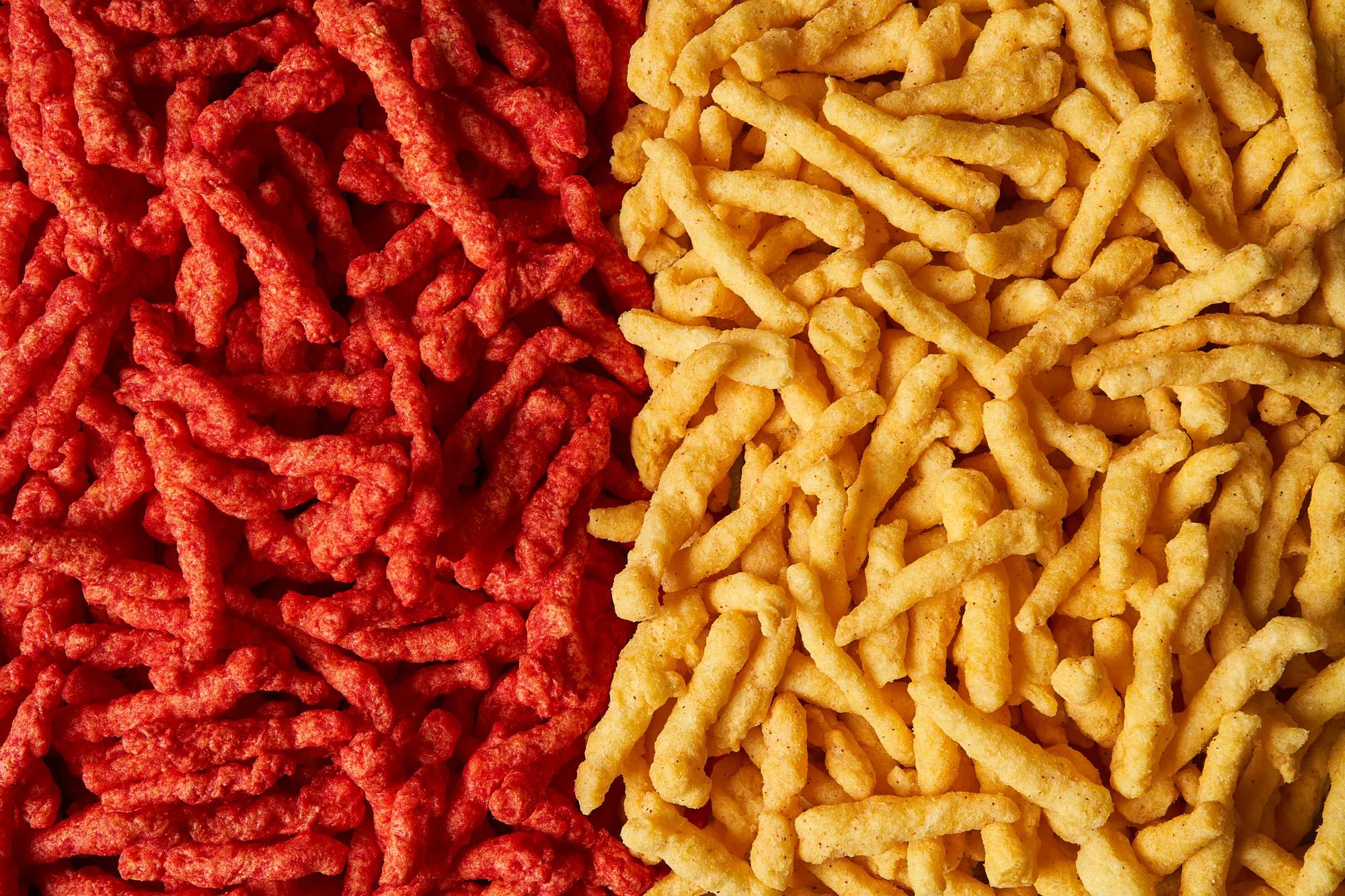 Cheetos® Flamin’ Hot Crunchy (left) pictured next to new Simply NKD™ Cheetos Flamin’ Hot Crunchy (right) Photo credit: Brielle Patton, D3 Studio