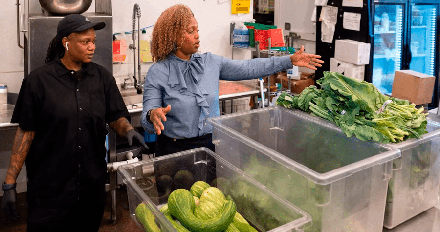 Gabe Madison (right) in the kitchen at Bonton Farms. Photo: Ben Torres